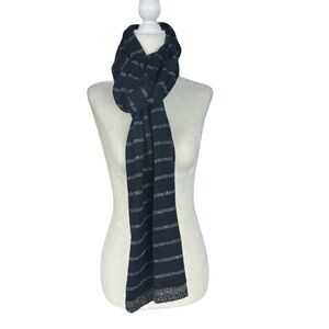 Black long knit scarf with silver metallic stripes. 80” long.